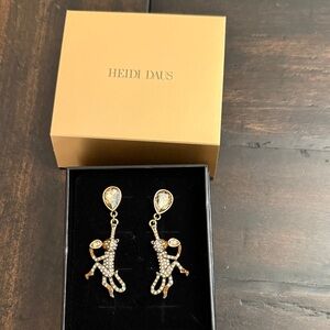 Heidi Daus Gold and Silver monkey Earrings omega